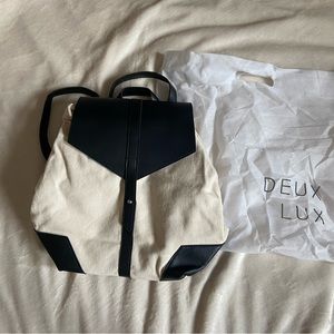 Deux Lux Messenger backpack bag black and white new